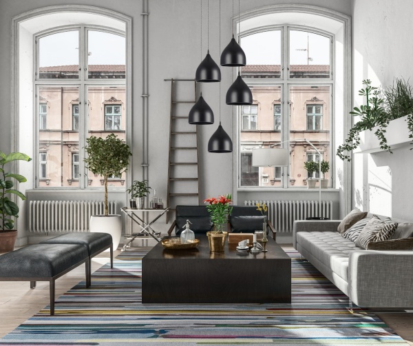 Lampa Noa 5 zawieszona w rustykalnym salonie.jpg