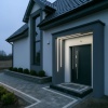 Linie LED oświetlające wejście do domu.