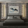 Kinkiety LED Linia w sypialni.